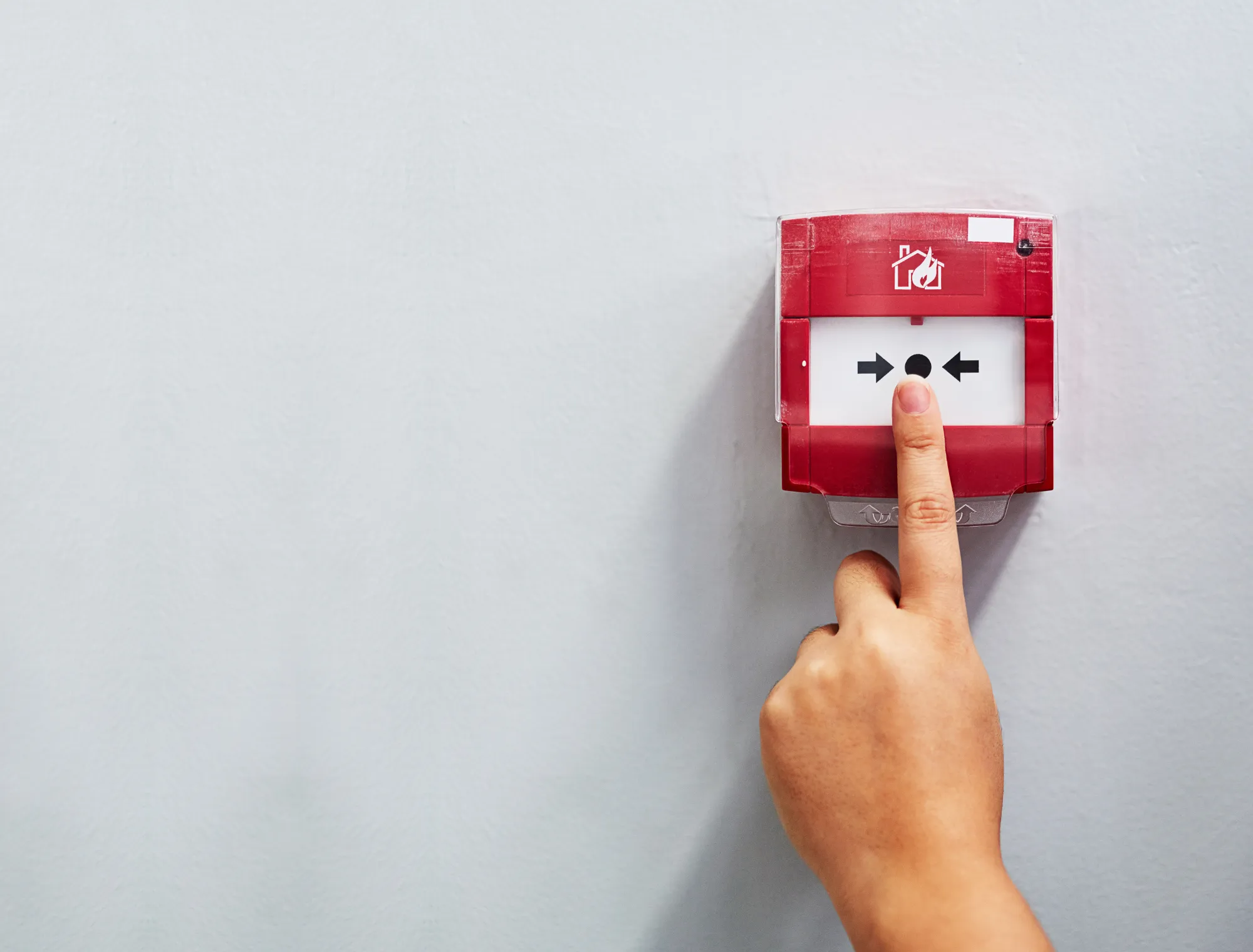 Fire safety engineer conducting a compliance check on a new fire alarm installation